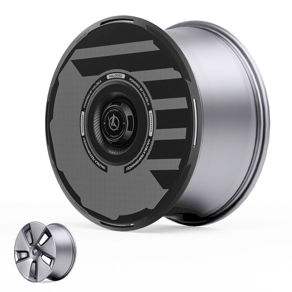 The HALODISC 2 Wheel Covers by HALOBLK Store for Tesla Model 3 (2017-2023) 18" Aero Wheels are shown in sleek black and gray next to a traditional five-spoke silver alloy wheel, both on a white background.