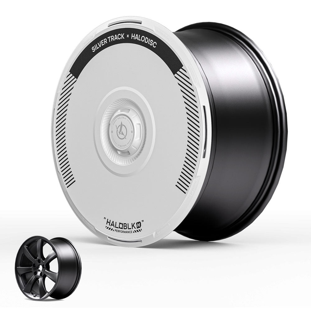 HALOBLK Store’s HALODISC 2 Wheel Covers for Tesla Model 3 (2017-2018) 19" Performance Wheels丨Silver Track: sleek black wheel with removable white cover, “Silver Track x Halodisc,” and standard multi-spoke design beneath.