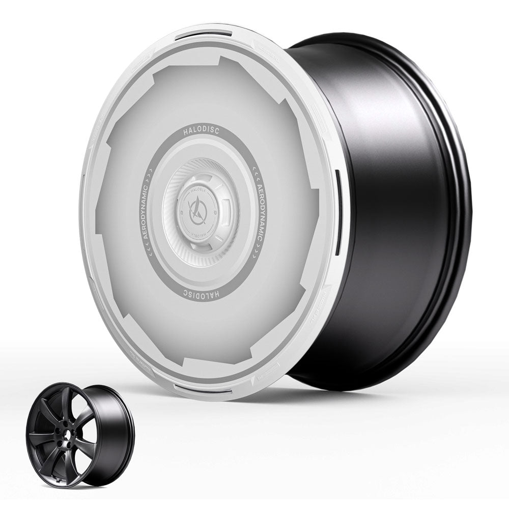 The HALOBLK Store’s HALODISC 2 Wheel Covers for Tesla Model 3 2017-2018 19" Performance Wheels丨Vision-GT are shown with a sleek, metallic, futuristic design, partially transparent, beside a smaller five-spoke rim for comparison.