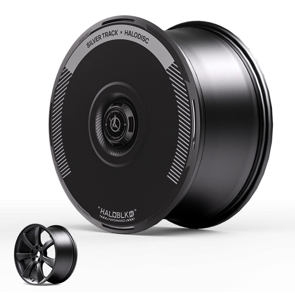 HALODISC 2 Wheel Covers for Tesla Model 3 2017-2018 19" Performance Wheels in Silver Track by HALOBLK Store: a modern, solid black disc design shown next to a standard multi-spoke rim for comparison.