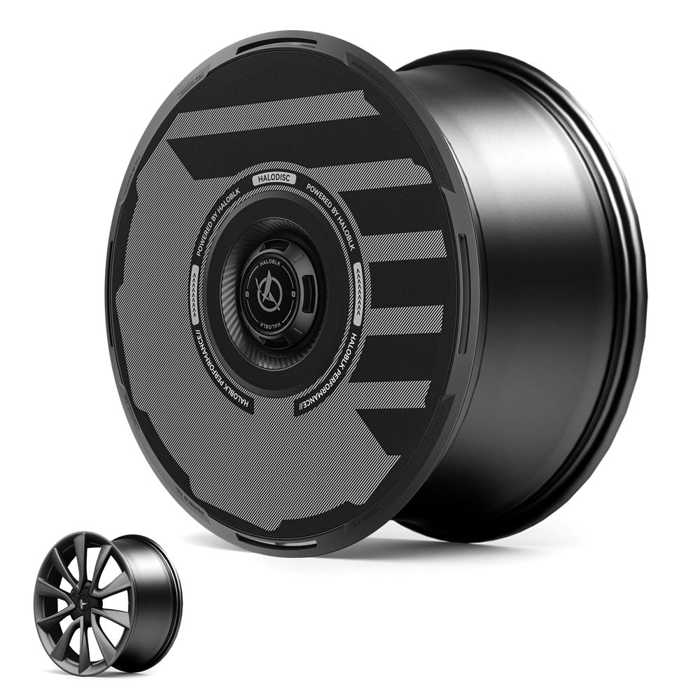 The HALOBLK Store's HALODISC 2 Wheel Covers for Tesla Model 3 2018-2023 19" Stiletto Wheels feature a sleek, black, aerodynamic design with angular details. A smaller, traditional five-spoke rim is displayed in the lower left for comparison.