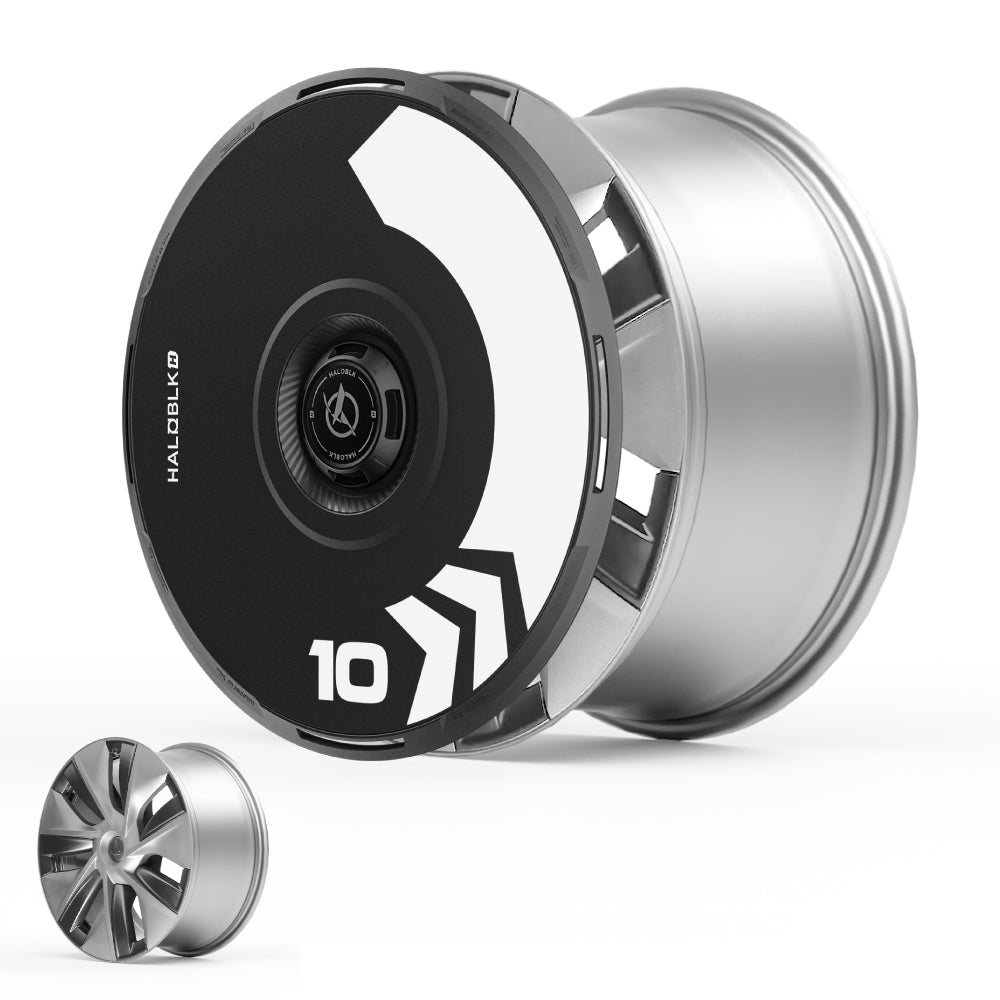 The HALODISC 2 Wheel Covers by HALOBLK Store fit 2017-2018 Tesla Model 3 19" Power Sports Wheels. The sleek Arrow design features a modern black and white faceplate, partially covering the rim and labeled "HALOCK10.