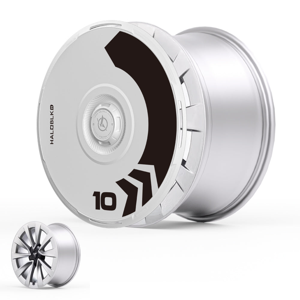 The HALODISC 2 Wheel Covers by HALOBLK Store for Tesla Model 3 (2019-2023) feature a modern silver alloy design with a bold black graphic, number 10, and angled accents. A smaller image displays an alternate wheel cover design for comparison.