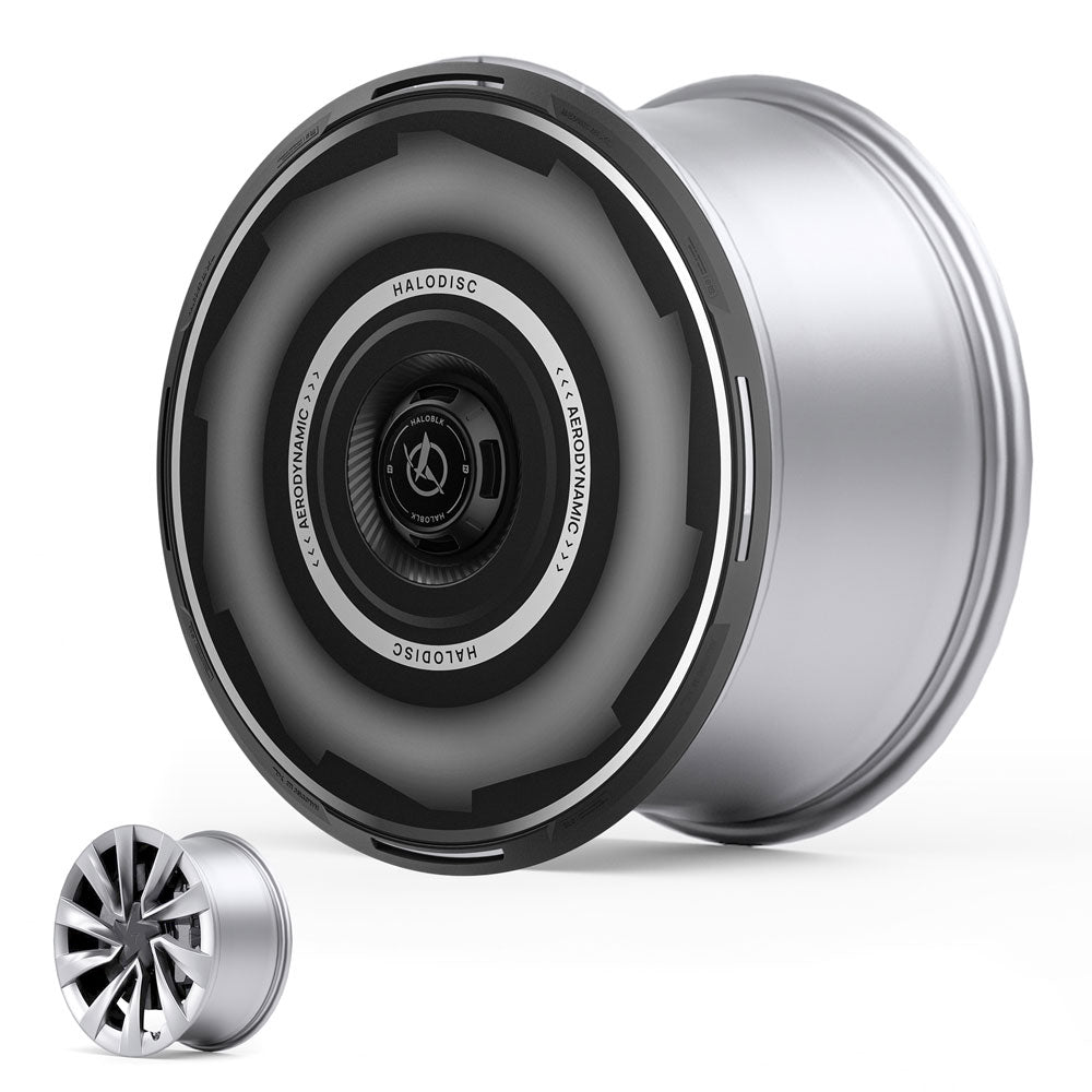 The HALODISC 2 Wheel Covers for Tesla Model Y Juniper 20" Helix 2.0 Wheels by HALOBLK Store feature a sleek, futuristic design with dark circular accents, displayed beside a traditional alloy rim on a white background.