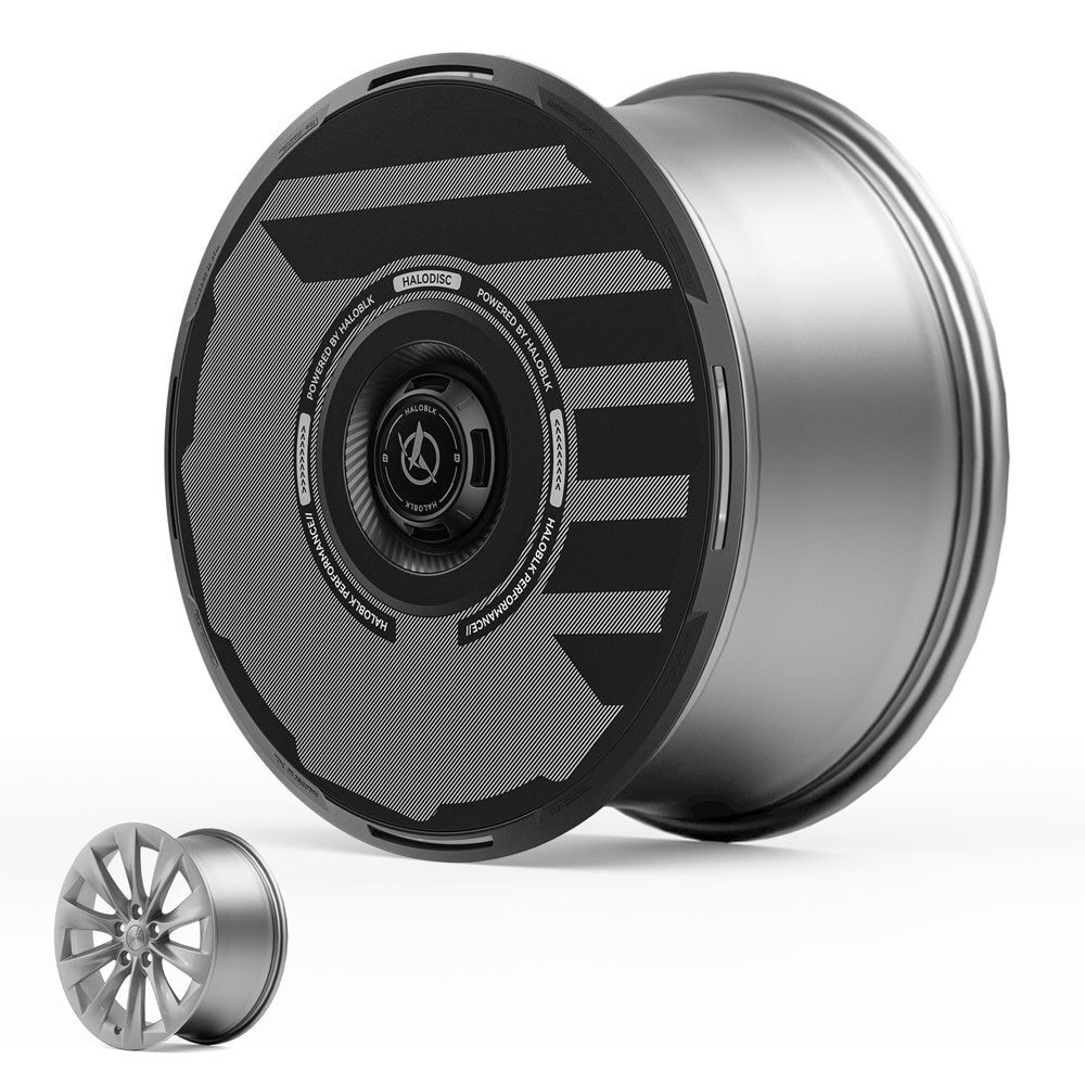 The HALODISC 2 Wheel Covers for Tesla Model S 19" Slipstream Wheels from HALOBLK Store feature a modern, metallic, black, textured faceplate, shown next to a traditional multi-spoke rim for comparison.