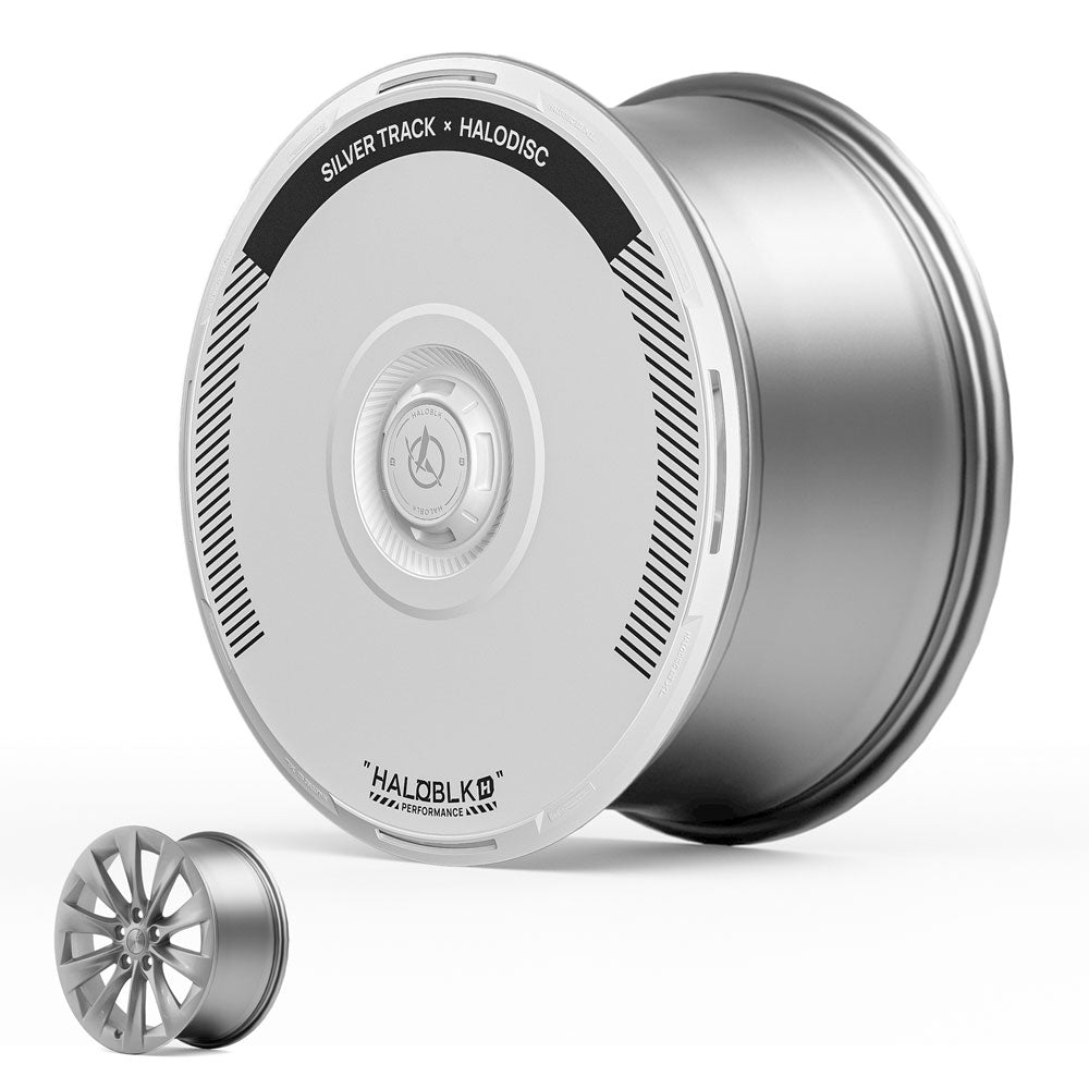 The HALOBLK Store's HALODISC 2 Wheel Covers for Tesla Model S 19" Slipstream Wheels in Silver Track are shown: a sleek, flat silver and white disc cover labeled "SILVER TRACK x HALODISC" beside a standard wheel rim for comparison.