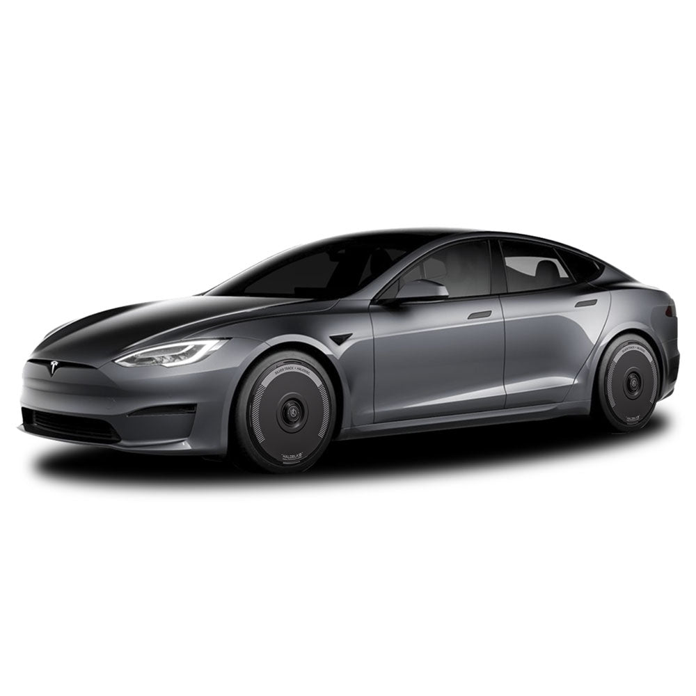 The HALODISC 2 Wheel Covers for Tesla Model S 21" Arachnid Wheels in Silver Track from HALOBLK Store are shown installed on a Tesla Model S, emphasizing their sleek fit and stylish enhancement to black wheels.