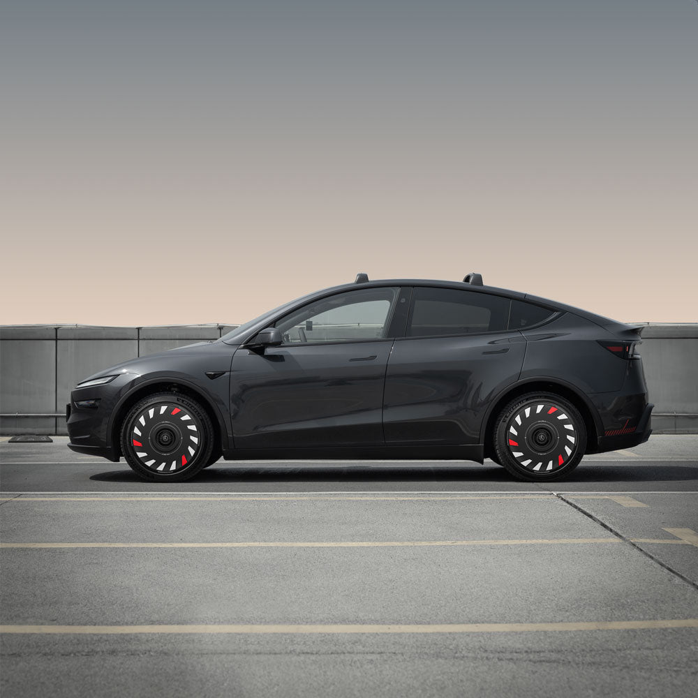 A Tesla Model Y with HALODISC 2 Wheel Covers from HALOBLK Store is parked in an empty outdoor lot, concrete barrier behind it, beneath a clear gradient sky. Designed for 20" Helix 2.0 Wheels Juniper丨Turbo.