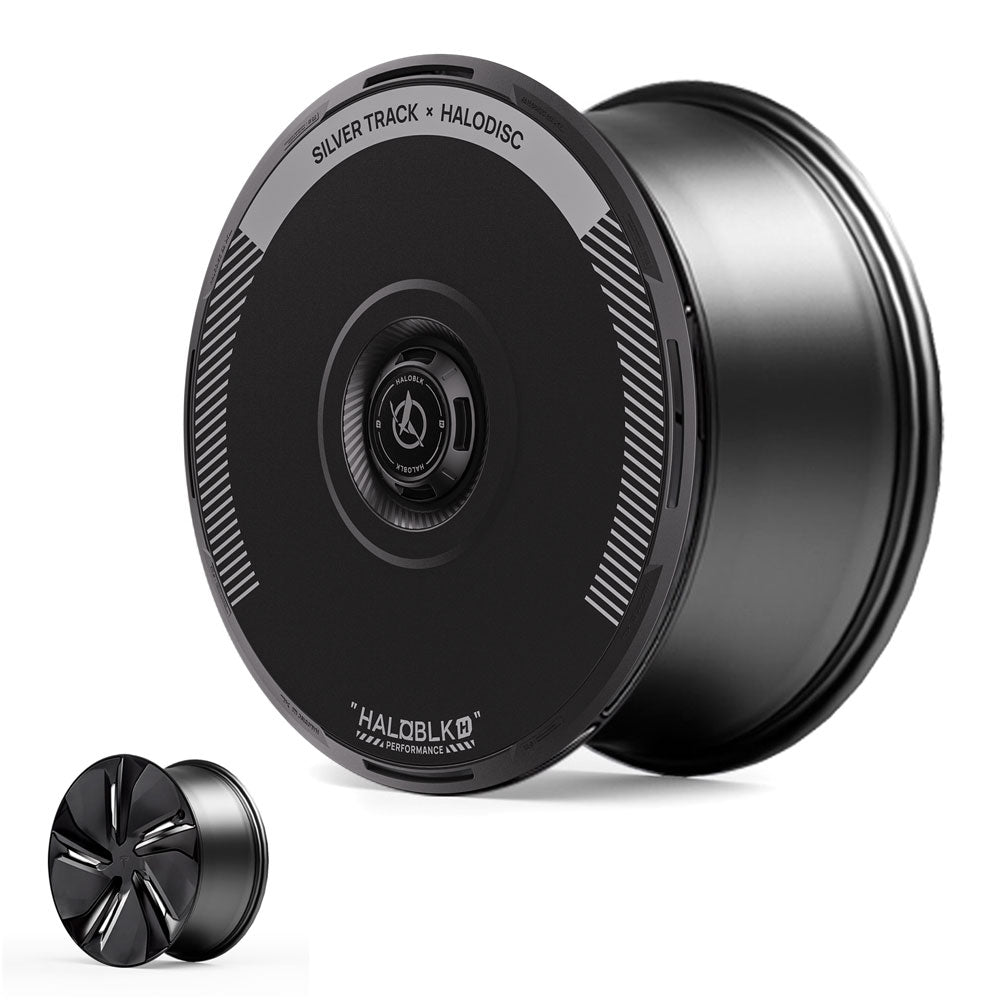 The HALOBLK Store HALODISC 2 Wheel Covers for Tesla Model Y Juniper 19" Crossflow Wheels in Silver Track feature a sleek black design, solid or vented disc styles, silver accents, and a center cap logo with “SILVER TRACK × HALODISC.”.