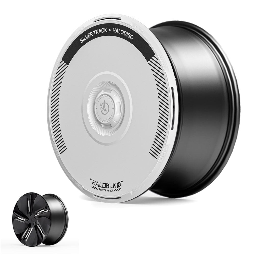 A pair of HALODISC 2 Wheel Covers from HALOBLK Store for Tesla Model Y Juniper 19" Crossflow wheels, featuring a silver cover with "Silver Track x Halodisc" text and a smaller black cover with three bold spokes.