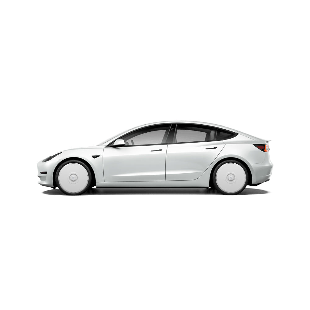 A side view of a white Tesla Model 3 (2019-2023) with HALODISC 2 Wheel Covers by HALOBLK Store on 19" Zero-G wheels, showcasing sleek, aerodynamic lines and minimal detailing against a plain white background.