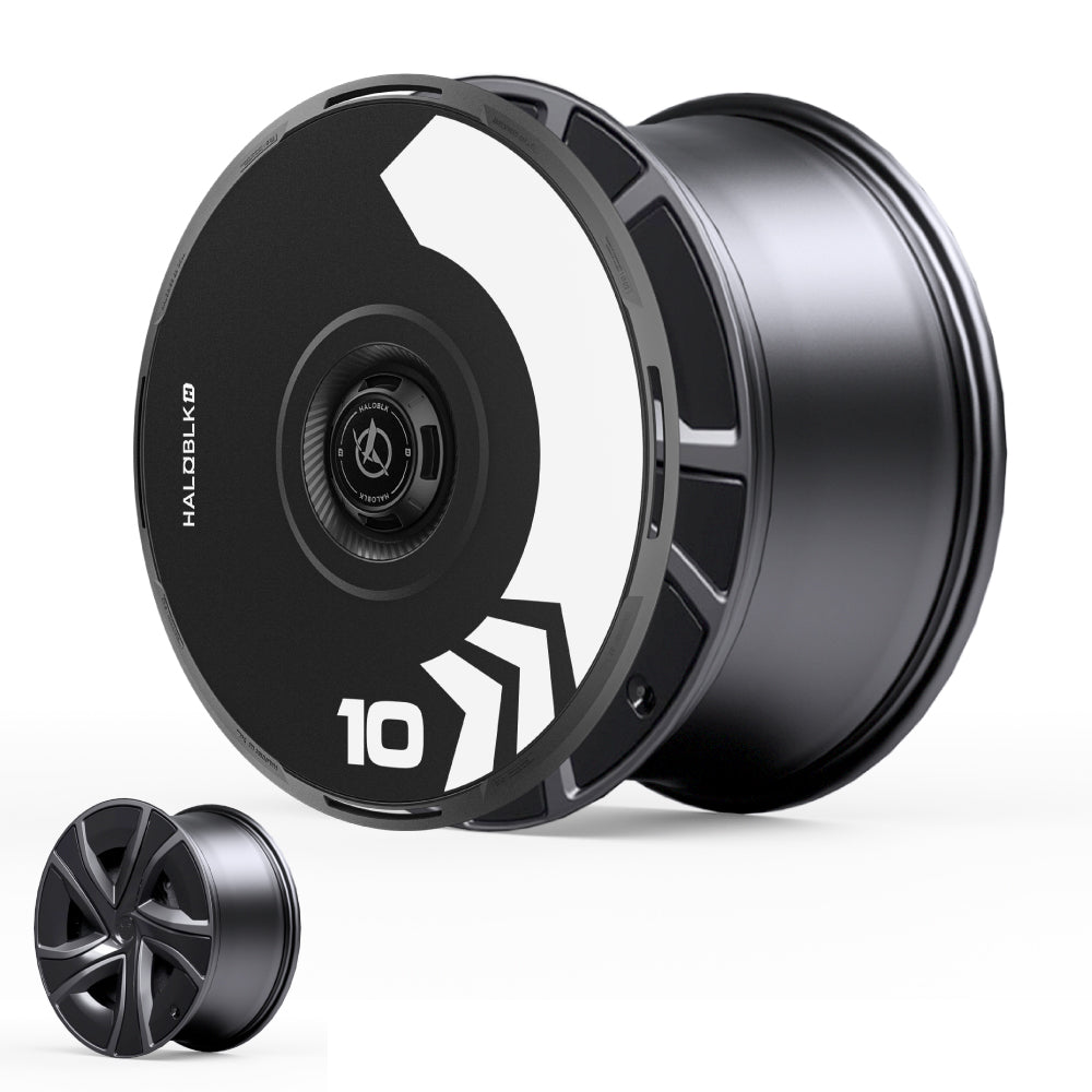 The HALODISC 2 Wheel Covers by HALOBLK Store for Tesla Model X 2021-2025 20" Perihelix wheels feature a bold, modern black design with white geometric arrow patterns and the number 10, plus a smaller five-spoke wheel illustration.