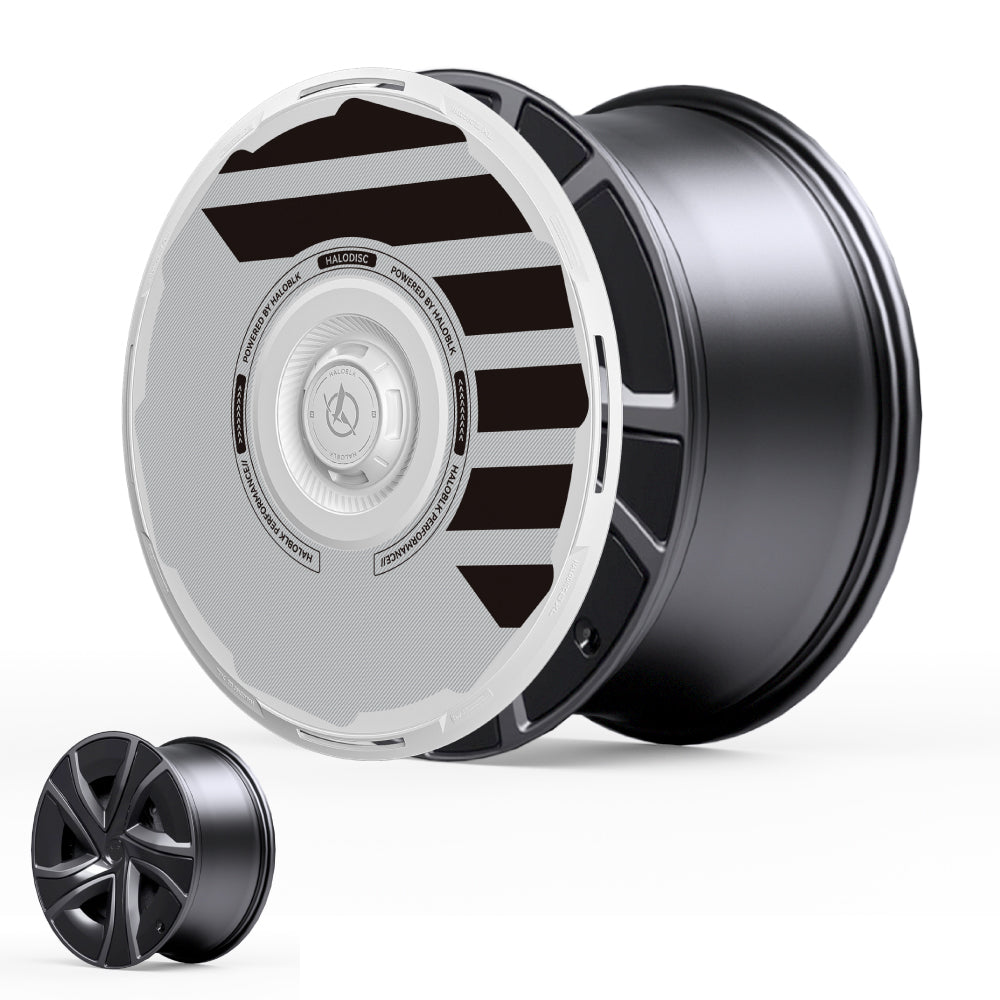 A large black HALODISC 2 wheel cover for Tesla Model X 2021-2025 20" Perihelix wheels by HALOBLK Store features a white and gray circular design with black diagonal stripes; a smaller rim appears in the bottom left corner.