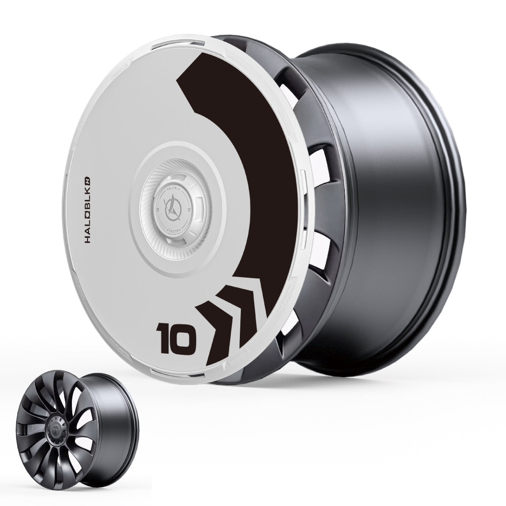 The HALODISC 2 Wheel Covers for Tesla Model 3 2021-2023 by HALOBLK Store feature a modern black and silver design with bold geometric patterns and the number 10, shown in large and small sizes. Fits 20" Überturbine wheels. Arrow style.