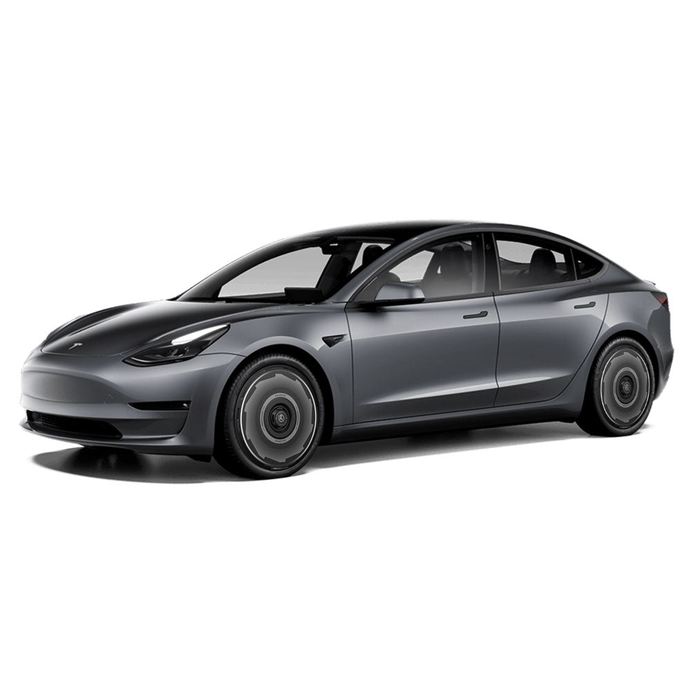 The HALOBLK Store HALODISC 2 Wheel Covers for Tesla Model 3 2017-2018 (19" Performance Wheels, Vision-GT) are shown on a sleek, dark gray electric sedan with smooth lines and tinted windows, viewed from the front left against a white background.