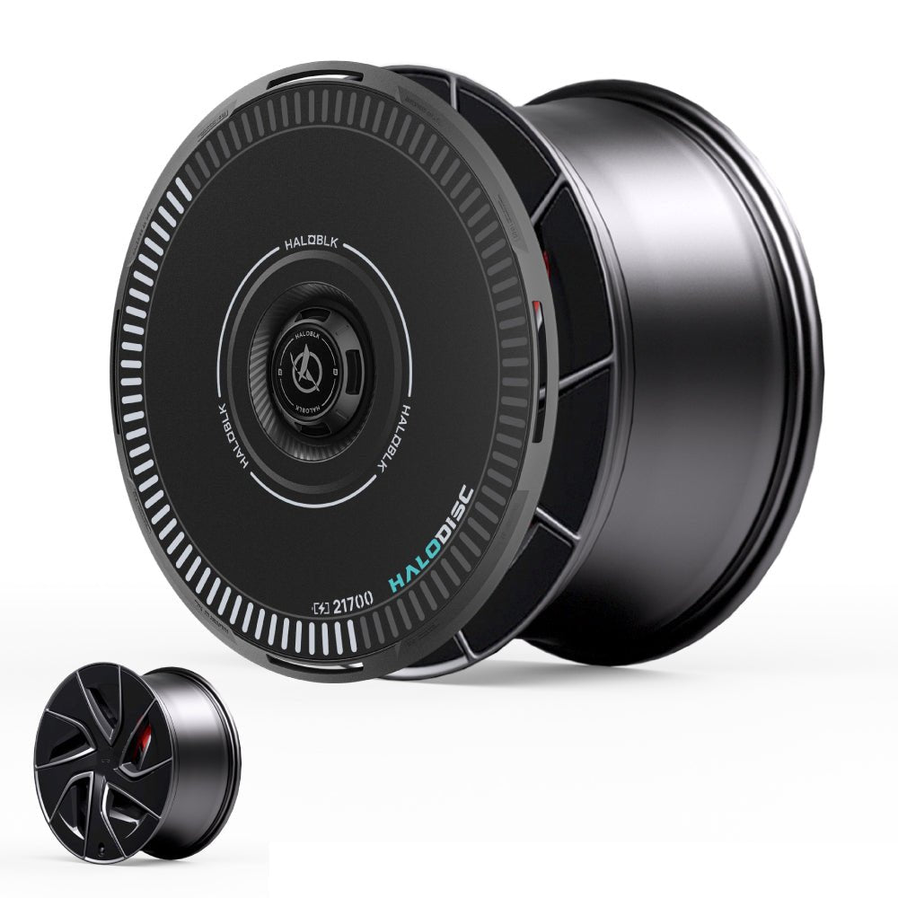 A close-up of the HALODISC 2 Wheel Cover for Tesla Model S 19" Magnetite Wheels by HALOBLK Store, a sleek black cylindrical cover labeled HALODISC, with a smaller version in the corner for scale and charging feature highlighted.