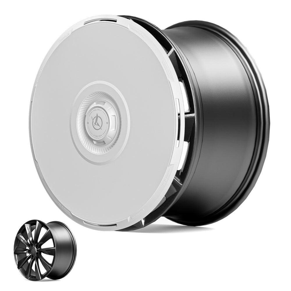 The HALODISC 2 Wheel Covers for Tesla Model S 21" Turbine Wheels by HALOBLK Store feature a sleek black rim with a smooth silver cover that conceals the spokes. A small inset shows the uncovered rim’s multi-spoke design.