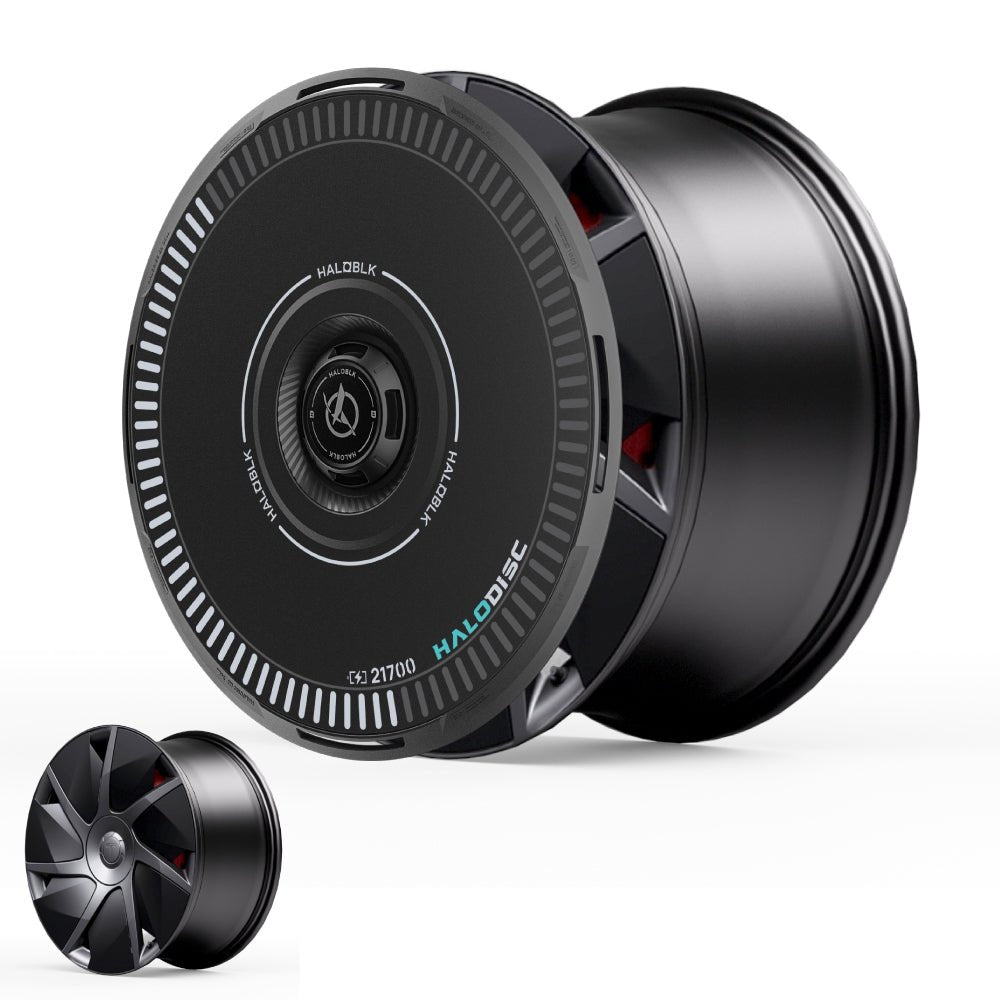 The HALOBLK Store's HALODISC 2 Wheel Covers for Tesla Model S 21" Velarium Wheels feature a futuristic black cylindrical design with a disc-shaped front marked "HALODISC," sleek radial patterns, subtle teal text, and a smaller matching cover.