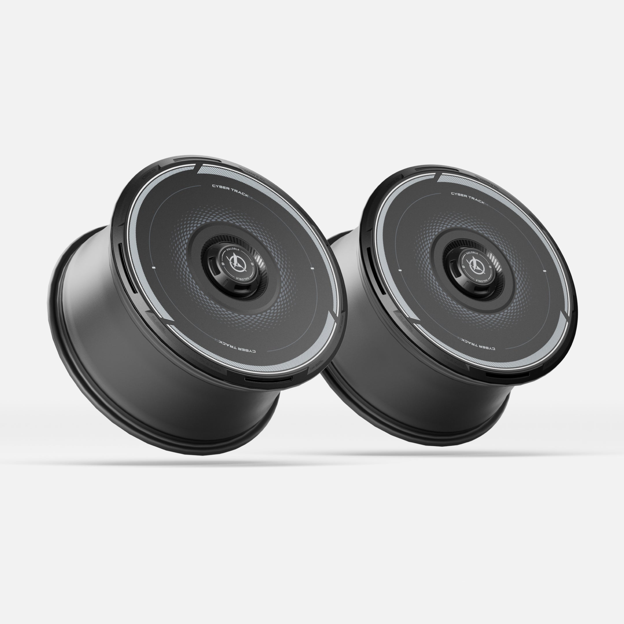 Two black, modern HALODISC 2 Wheel Covers for Tesla Model 3 from HALOBLK Store are shown side by side with a sleek, futuristic design against a plain white background.