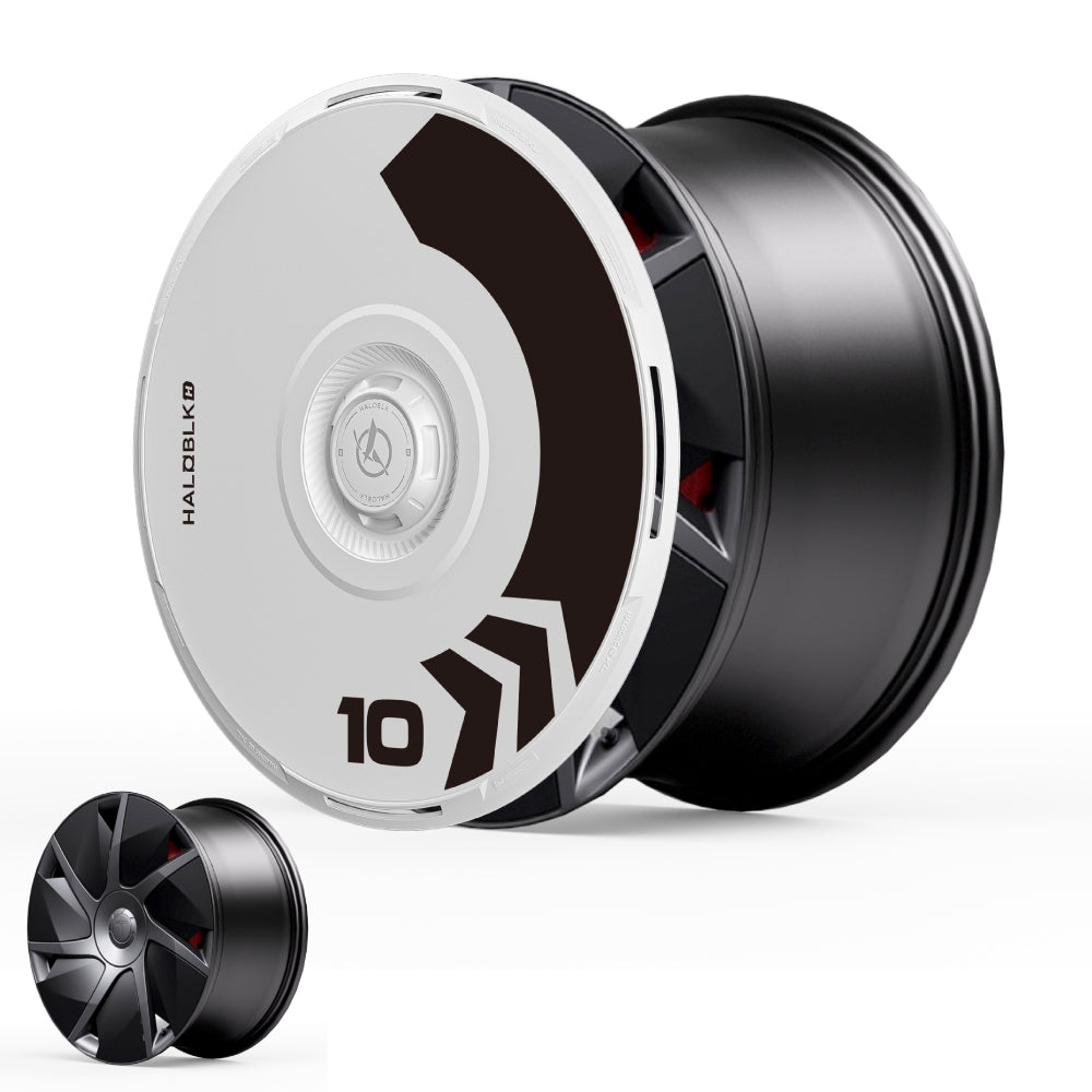 The HALOBLK Store HALODISC 2 Wheel Covers for Tesla Model S 21" Velarium Wheels feature a black and silver design with geometric accents, the number 10, and the word HALOBLK10. An uncovered wheel is shown in the lower left corner.