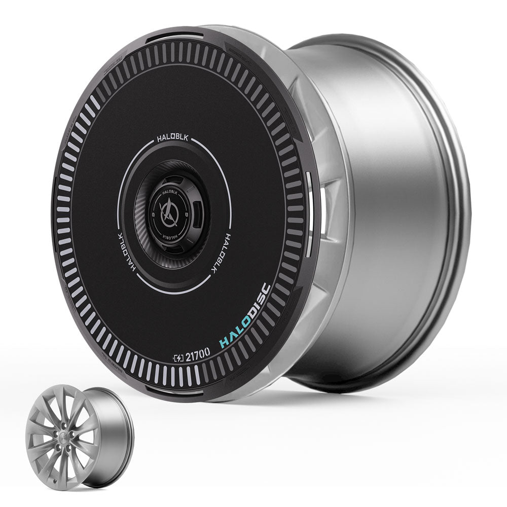 A close-up of HALODISC 2 Wheel Covers for Tesla Model S 19" Slipstream Wheels by HALOBLK Store, highlighting the sleek metallic rim with a black center cap labeled HALODISC and a smaller cover displayed in the foreground.