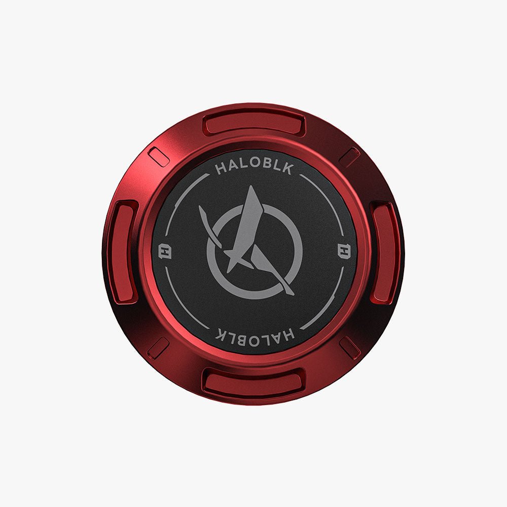 A round black and metallic red HALODISC Cap from HALOBLK Store, featuring "HALOBLK" text and a silver rocket logo at the center, viewed from above on a white background.